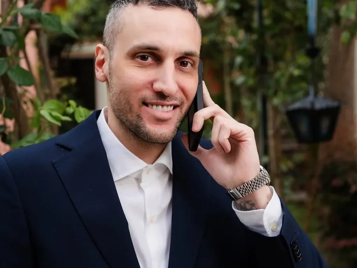 Michael in suit during private contact