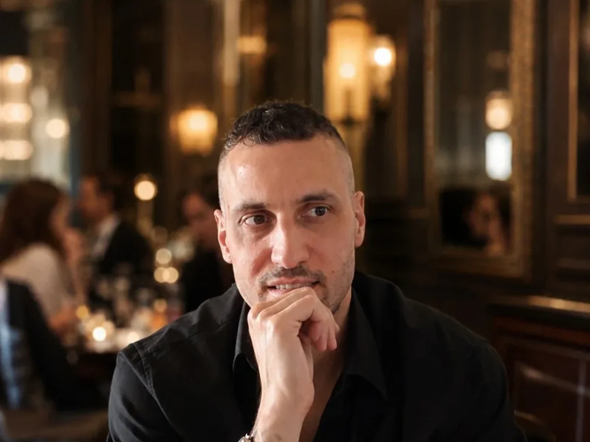 Michael seated during a dinner setting