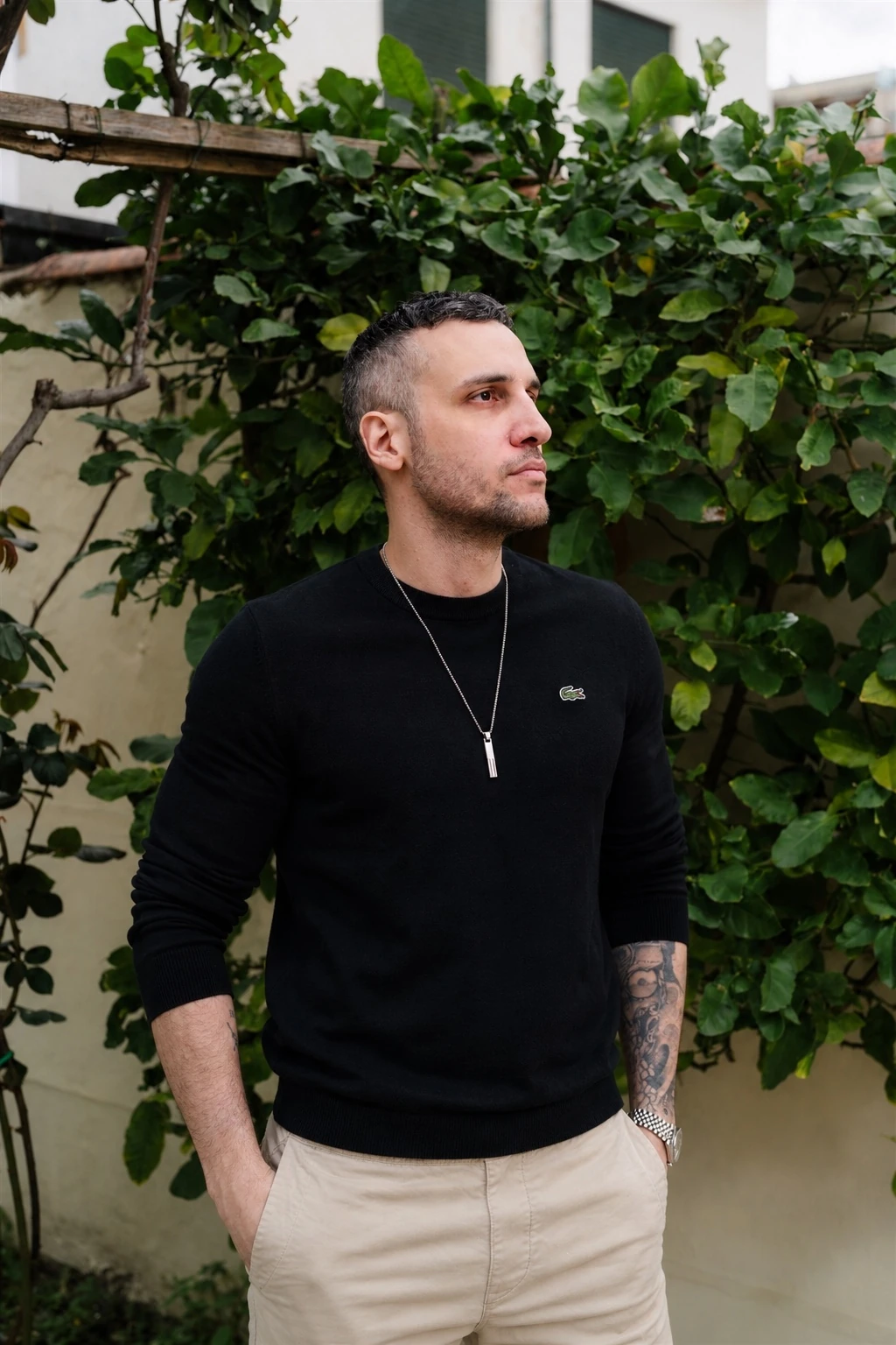 Michael wearing black in a garden setting